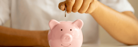 saving money in a piggy bank